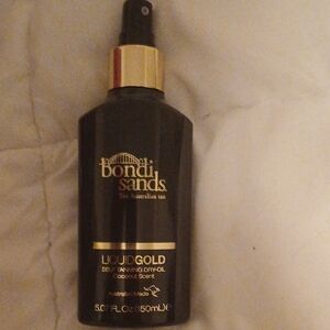 Bondi Sands Liquid Gold Tanning Oil in Black and Gold